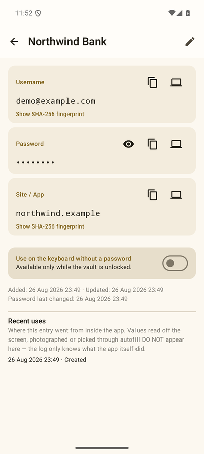 An entry. The password stays masked; the icons beside each field copy it or type it into a computer.